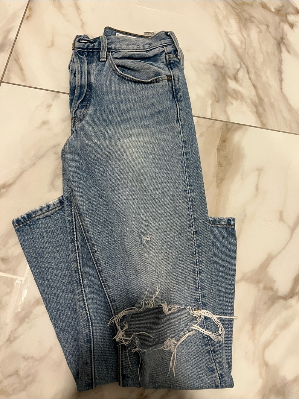 Levi's light blue ripped straight jeans